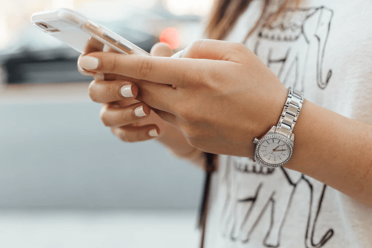Woman Receiving SMS Marketing Texts